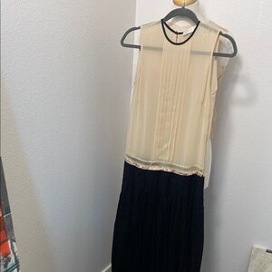 Elegant Cream and Black Sleeveless Dress